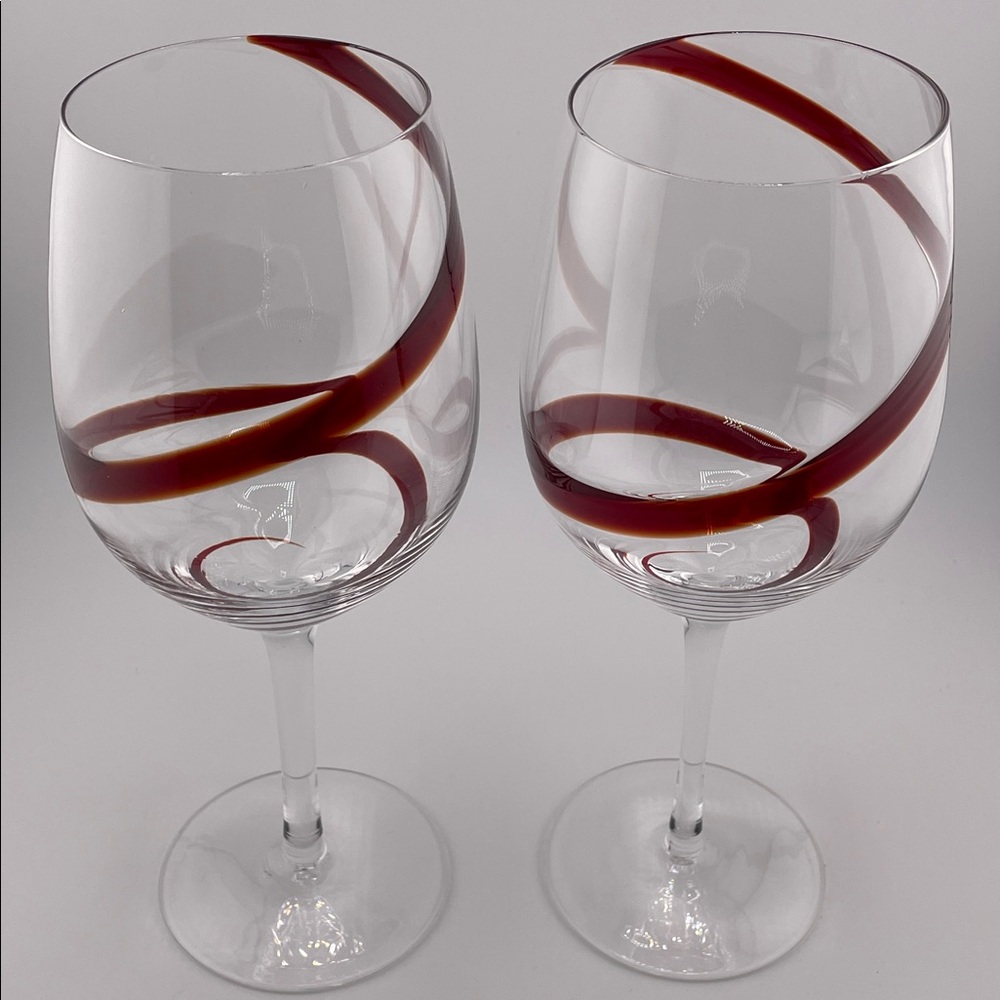 Elegant Wine Glasses with Red Swirl